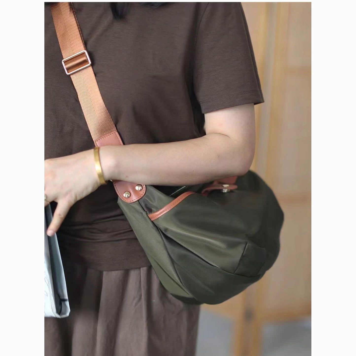 Nylon oxford cloth crossbody bag back view - adjustable strap