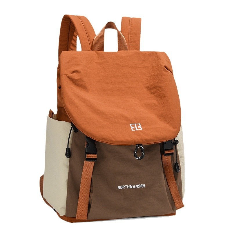 Women's travel backpack detail shot - quality zippers and hardware