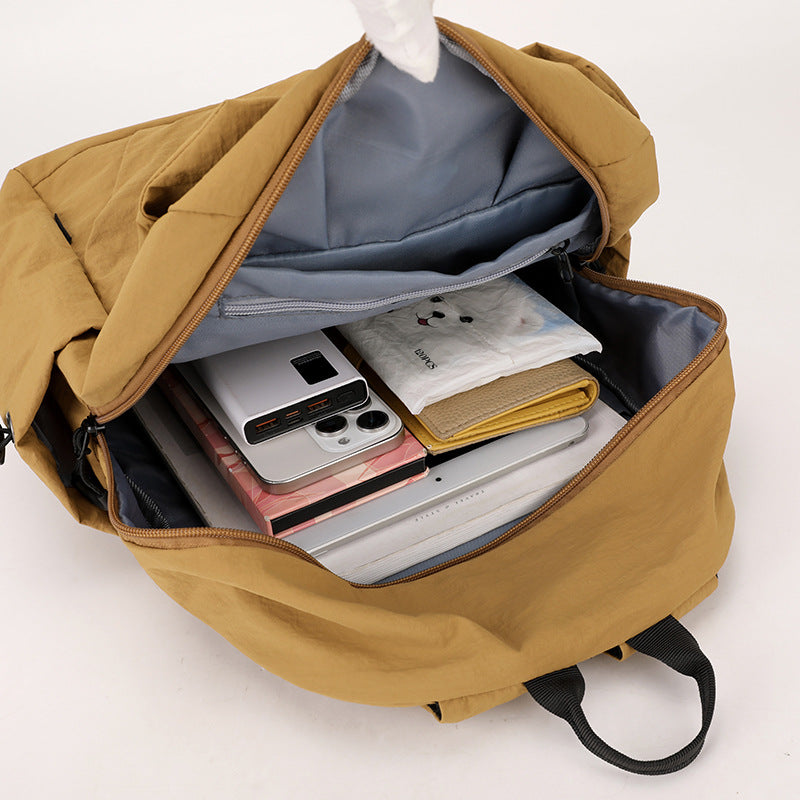 Mini nylon backpack interior view - multiple compartments