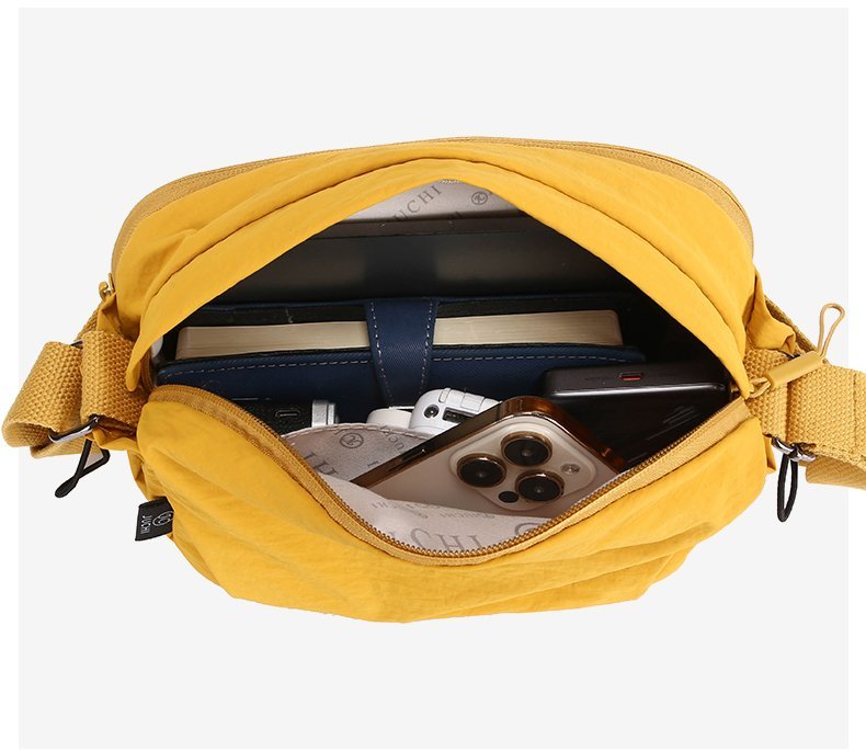 Women's nylon crossbody bag showcase - lightweight saddle design