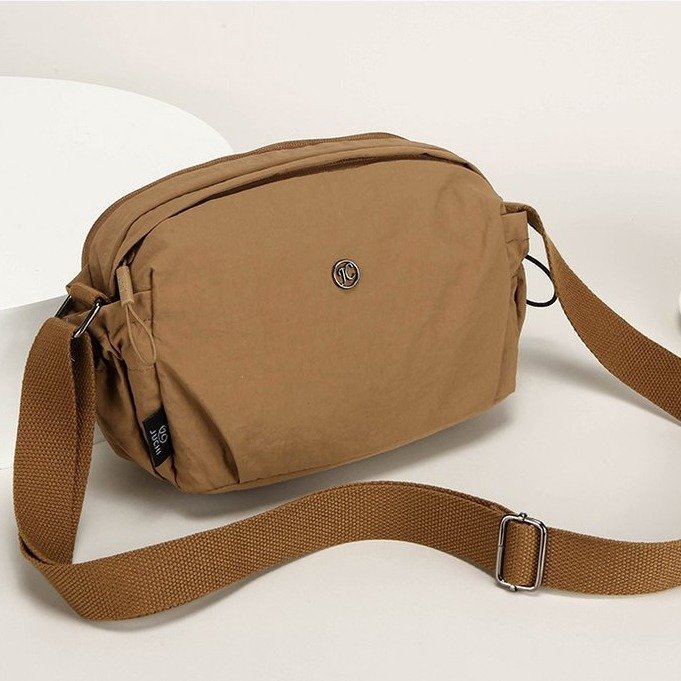 Women's nylon crossbody bag front view - simple casual design