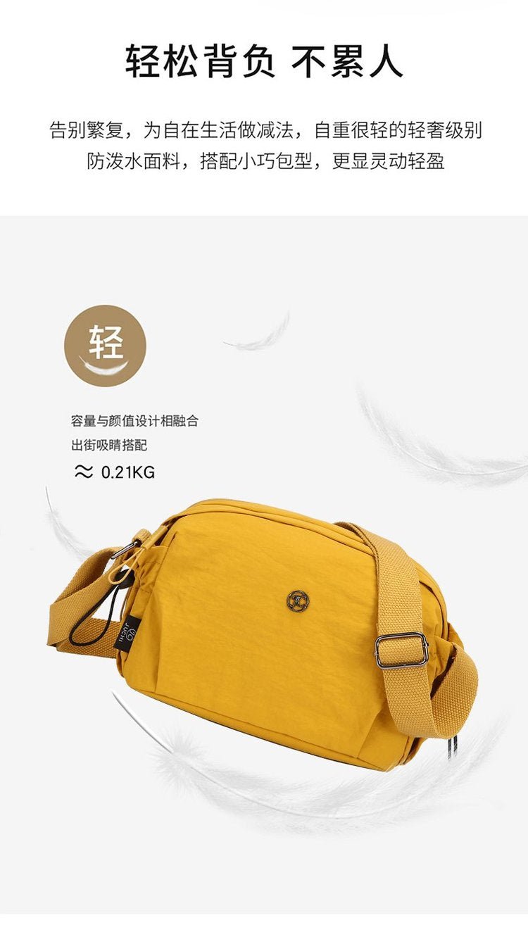 Women's nylon crossbody bag worn - practical casual style