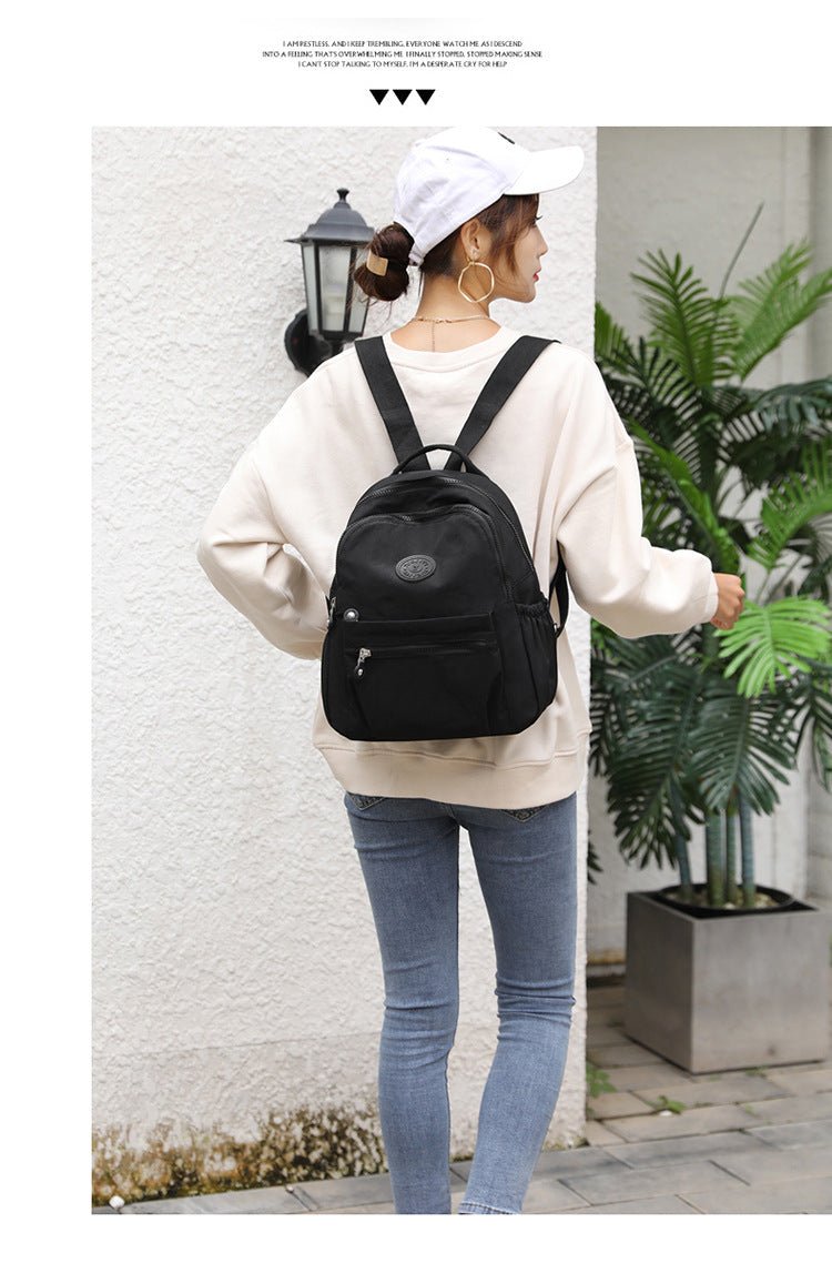 Women's nylon oxford backpack styling - modern korean aesthetic