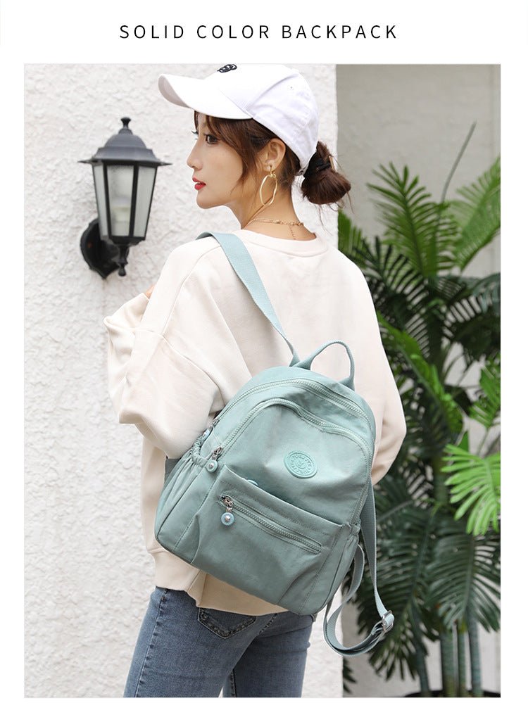 Women's nylon oxford backpack capacity - spacious interior layout